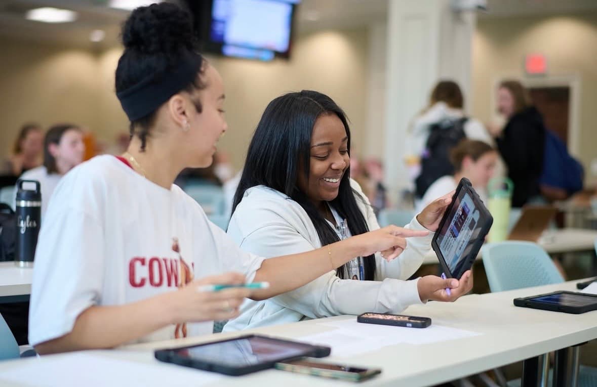 Nursing students working together with SimVS equipment